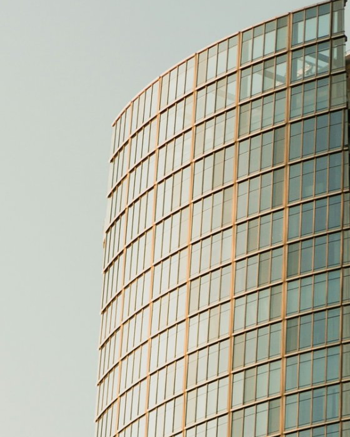 Detail of a curved glass office tower facade, City of London